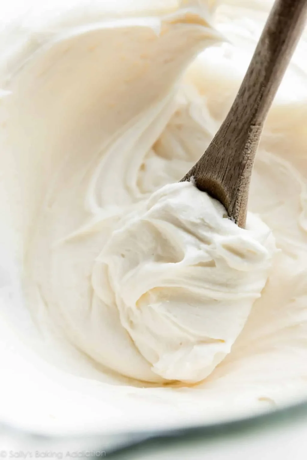 Homemade Vanilla Buttercream Frosting spread on a cake
