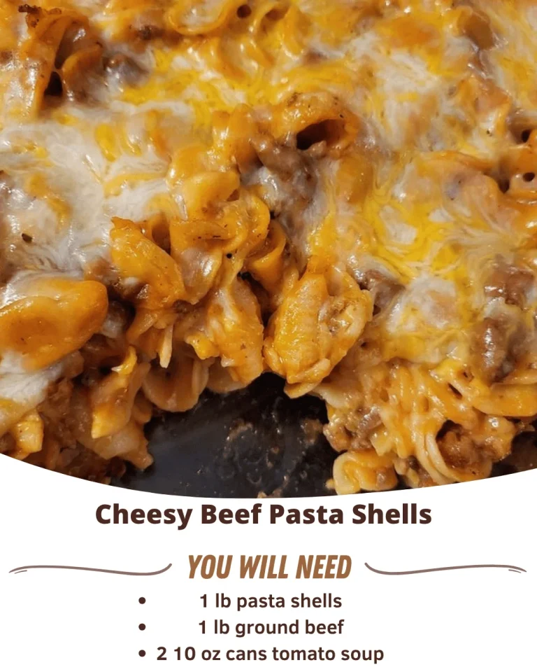 Cheesy beef pasta shells served with a creamy sauce and garnished with herbs.