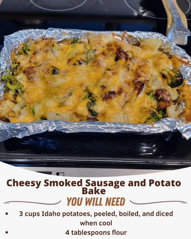 Cheesy smoked sausage and potato bake dish ready to serve