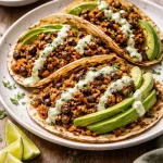 Black Bean Quinoa Tacos with Cilantro Lime Cashew Cream served on a plate