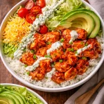 Delicious Buffalo Chicken Bowl with colorful toppings and spices