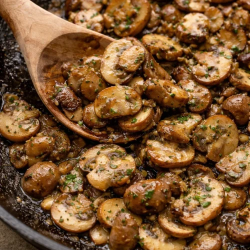 Deliciously sautéed mushrooms with garlic, served as a perfect side dish