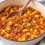 Easy ground beef recipes for dinner served on a plate with vegetables.
